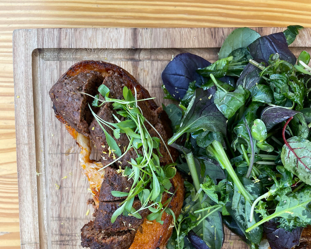 Beef Choripan, Chimichurri, & Greens