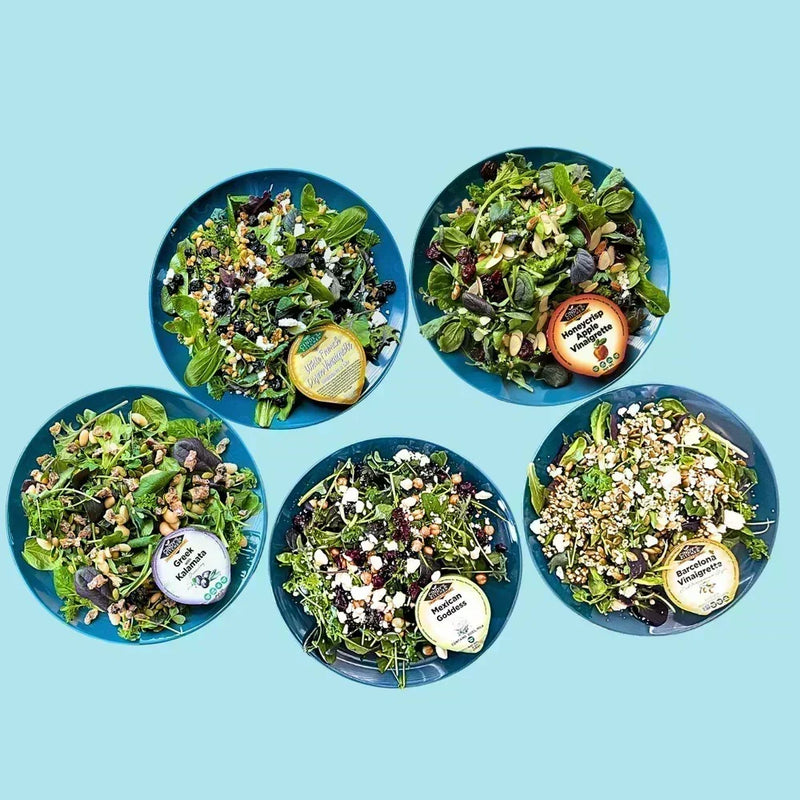 Planted Detroit ready-to-eat salad bowls made with fresh indoor-grown greens and flavorful toppings.
